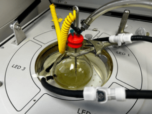 Laboratory setup with round-bottom flask.